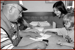 Fingerprinting clinic for children: gives parents a chance to warn kids about strangers!