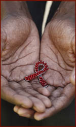 HIV symbol in hands (Aids).