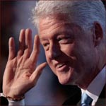 Former US president Bill Clinton: right hand wave.