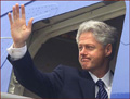 Former US president Bill Clinton: right hand waving.
