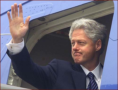 US president Bill Clinton: hand waving photo of his right hand.