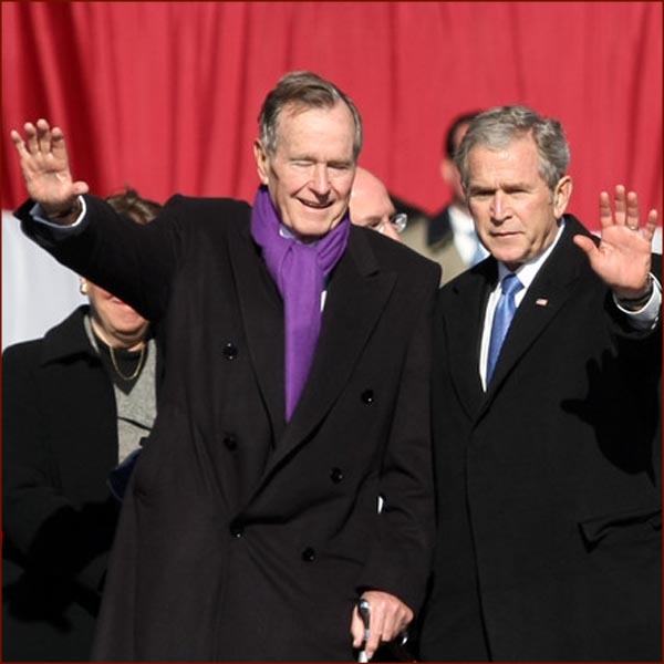 US president George H.W. Bush & George W. Bush waving hands