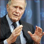 Former US president George H.W. Bush: hand gesture.