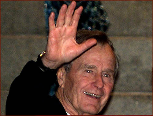 US president George H.W. Bush: hand waving photo of his right hand