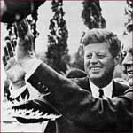 Former US president John F. Kennedy: right hand wave.