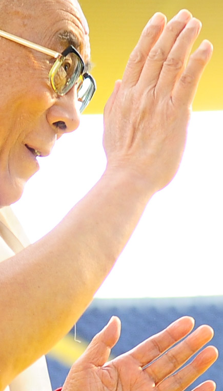 Hand gestures from the Dalai Lama.