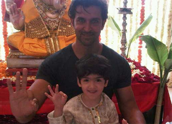 Hrithik Roshan with boy signing OK with Ganesha.