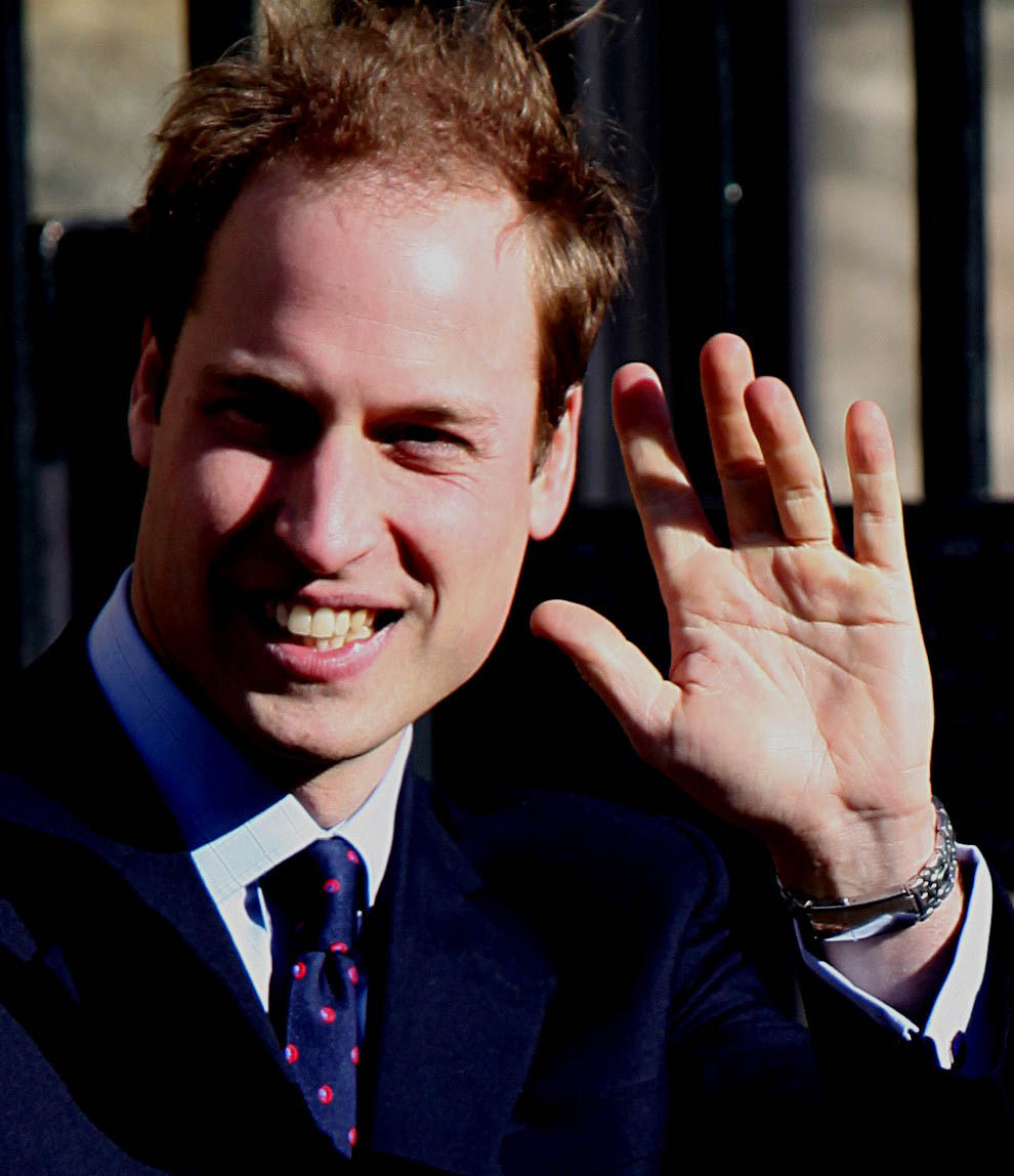 Prince William's waving left hand.