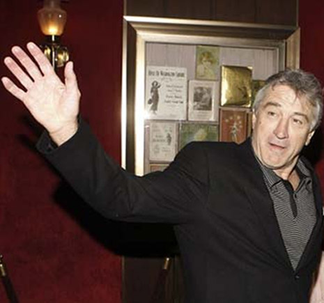 Robert de Niro's left hand is featured with a strong distal thumb phalange (strong impulse to 'will').