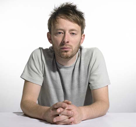 Thom Yorke with his thumbs folded.