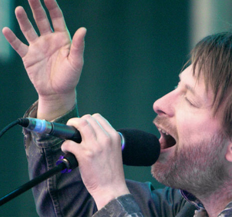 Thom Yorke has a simian line in his right hand.